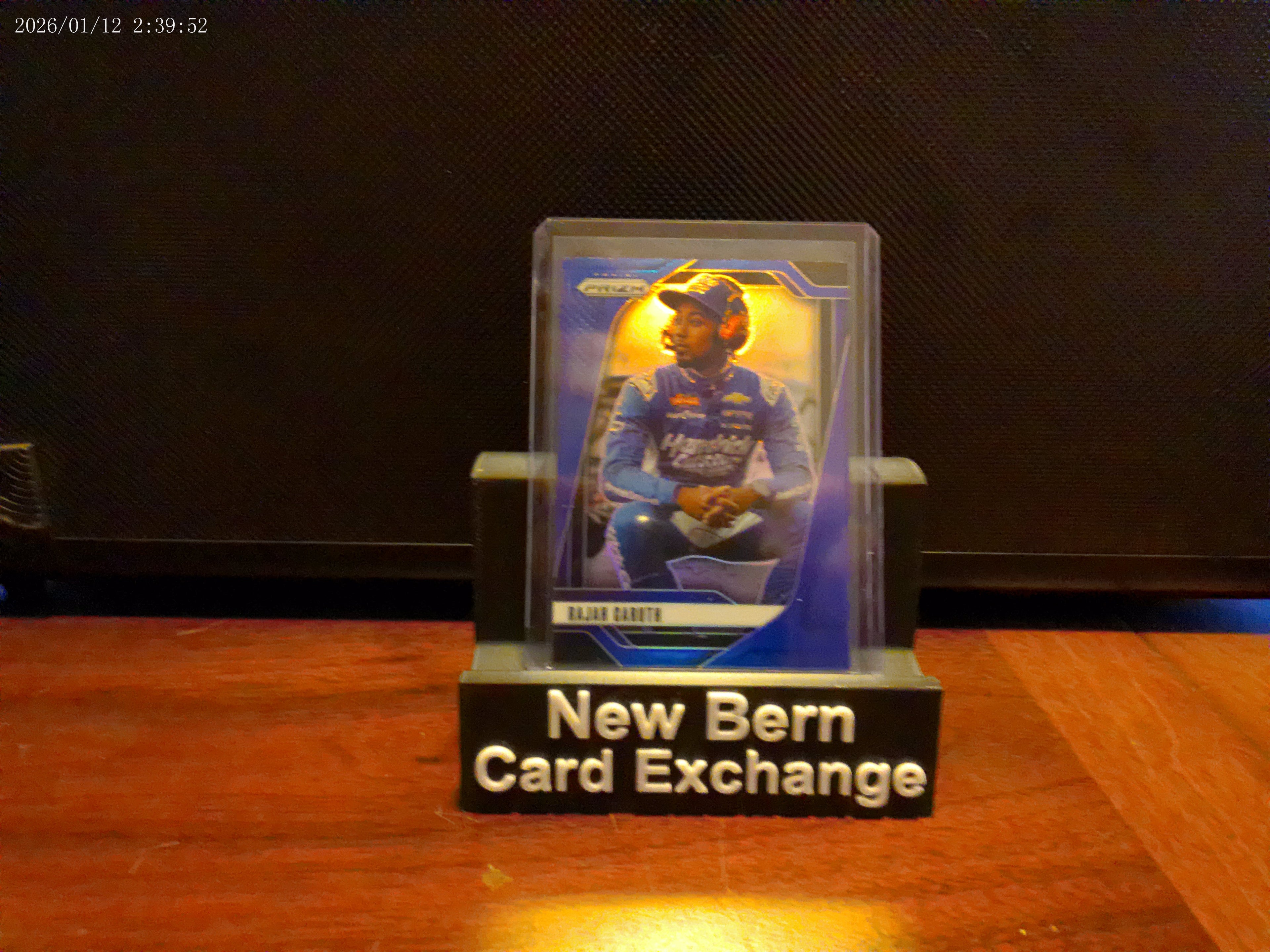 2025 Panini Prizm Racing Rajah Caruth Blue Prizm 057/199