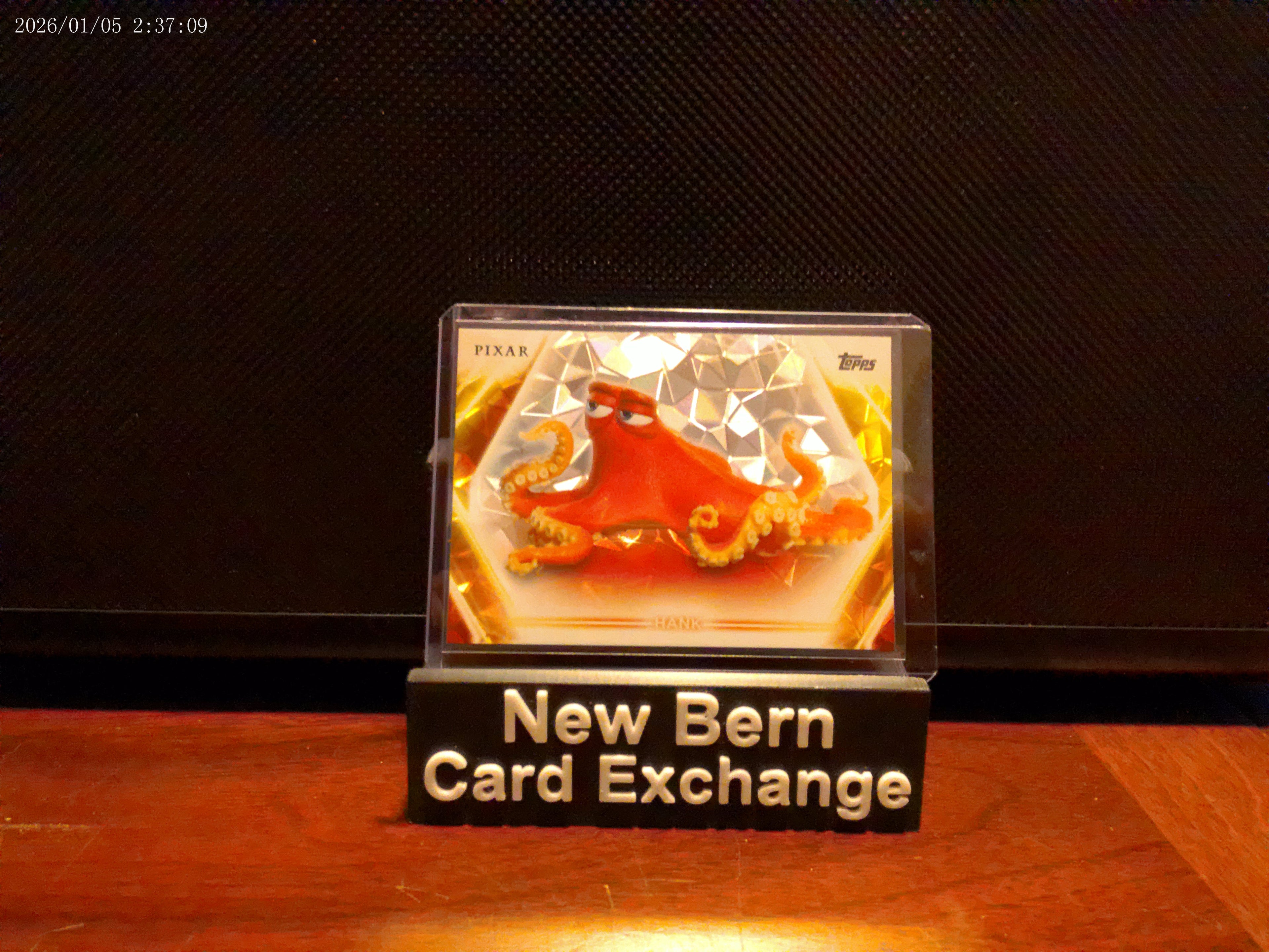 2026 Topps Disney Neon "Hank" Diamante Foil Refractor